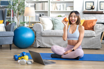 Portrait of sport slim fit strength asian woman training in sportswear relax and practicing yoga, fitness, exercise, wellness, workout, sport at home.Diet concept.Fitness and healthy lifestyle