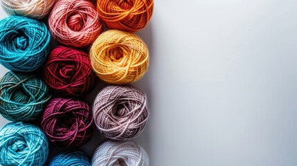 White background showcasing color yarn for knitting from a top perspective with space for duplication in a flat layout