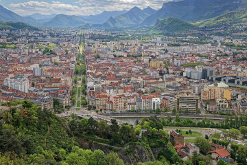 General view of the city of Grenoble from La Bastille hill and fortress with Vercors slopes in the...