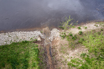 The mouth of a small stream into the Warta River - obrazy, fototapety, plakaty