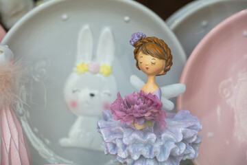 decorative toy girl figurine in shop window