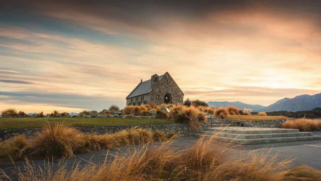 Sunrise glowing over Church of the Good Shepherd in autumn at Lake Tekapo, New Zealand