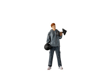 Miniature people , Young man lifting weights Isolated on white background with clipping path