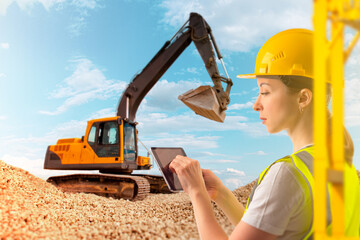 Woman engineer. Crawler excavator on rocks. Construction engineer with tablet computer. Girl...