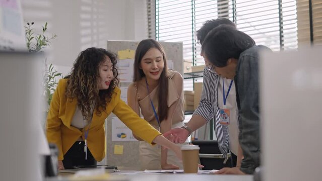 Asian businessman and woman standing brainstrom discuss business startup team ideas,solving problem solution and sharing for successful project launch,brainstorm strategy planing goal target achieve