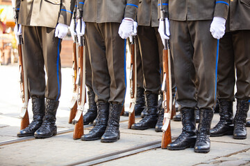Closeup of soldiers legs and guns