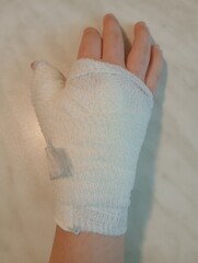 girl with bandaged hand
