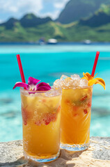 Exotic cocktails with tropical fruits in glasses with tropical coastline as a backdrop.