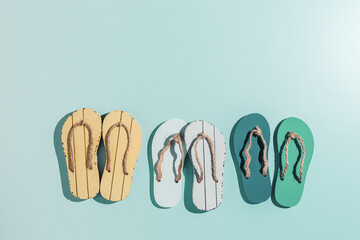 Summer flip flops flat lay, beach footwear vivid colored, top view still life with woman slide...