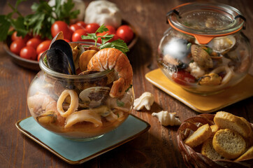 still life fish soup in jar