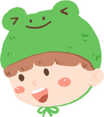 A child wearing a frog hat. The child has brown hair and brown eyes. The frog hat is green with a white belly and a smiling face.