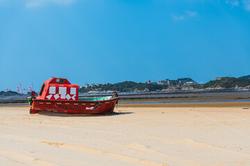 Fishing boat stranded on the beach