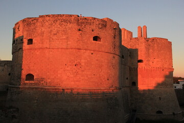 otranto castle at sunset lights, italy