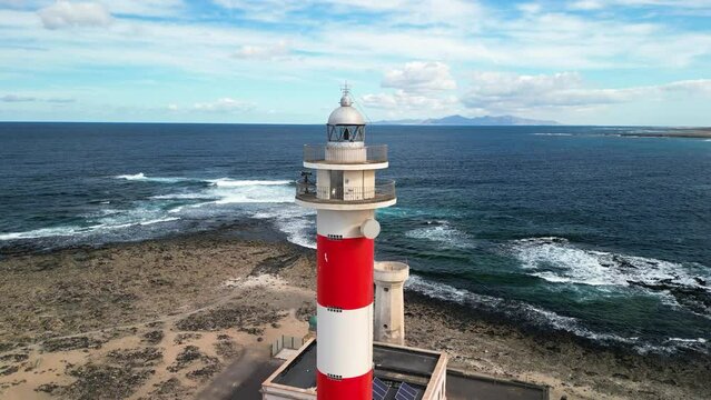 The Tost&oacute;n Lighthouse or El Cotillo Lighthouse is an active lighthouse on the Canary island of Fuerteventura. High-quality drone footage. 