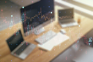 Multi exposure of abstract creative financial graph and modern desktop with computer on background, forex and investment concept