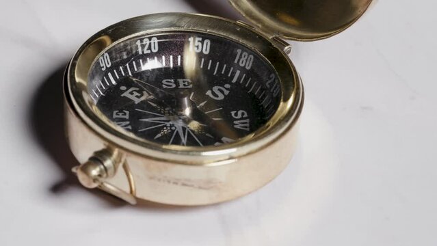 Dusty old antique compass true north navigation leadership concept