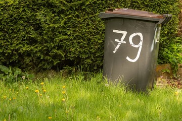 garbage can with the number 79