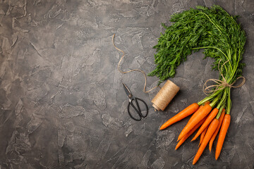 Carrots on a textured wooden background. Fresh and sweet organic carrots on a white background....