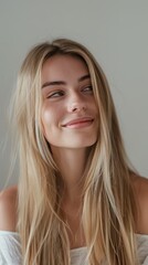 Naklejka premium Blonde, healthy, and shine for wellbeing, mild or loud on grey studio background. Portrait of woman and girl with clean, keratin, and scalp treatment, smiling or makeup.