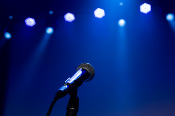Blue show lights with microphone isolated