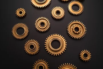 Fotobehang The gold gears isolated in black background. Concept of precision and engineering. © Aisyaqilumar