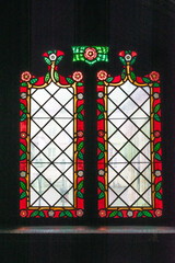 Colorful window of a church in Brugge