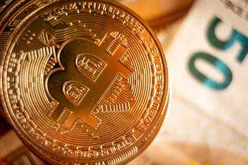 bitcoin close up and 50 euro note