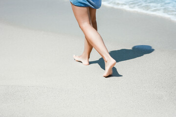 A Feet and footprints by the seashore in nature travel vacation background - 799132736