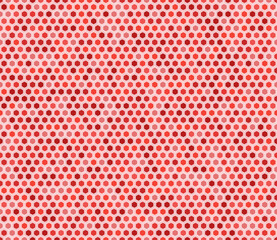 Honeycomb hexagons background. Rounded hexagons mosaic pattern with inner solid cells. Red color tones. Regular hexagon shapes. Seamless pattern. Tileable vector illustration.