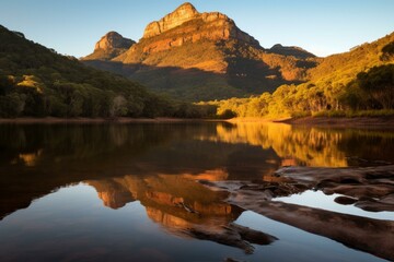 Obraz premium A beautiful landscape of a lake and mountains in the distance