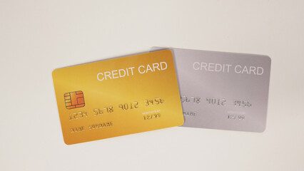 Two credit cards on white background.