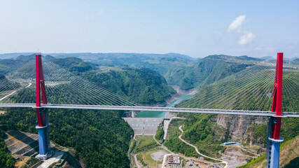 The Longli River Bridge in Guizhou was officially opened to traffic on April 27th. - obrazy, fototapety, plakaty