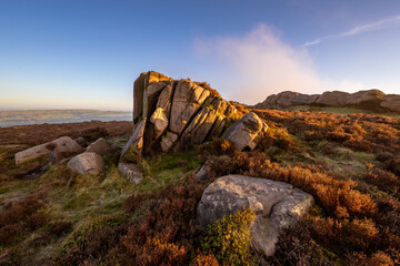 Golden hour sunrise at The Roaches in the Staffordshire Peak District National Park, England, UK.
