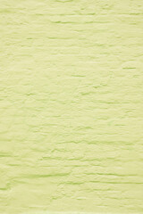 Brick wall covered with white plaster. Abstract construction background.