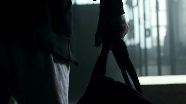 Fitness Journey: Mature Man Holding Gym Bag Arriving for Training - Captured in High-Resolution 4K Video