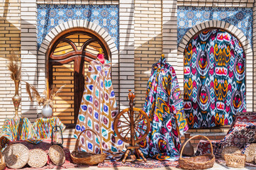 bright multicolored silk fabrics for dresses at the oriental bazaar in Uzbekistan in Tashkent