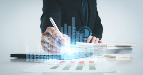 businessman plan the business plans and analyse profitability of working companies banking trading...
