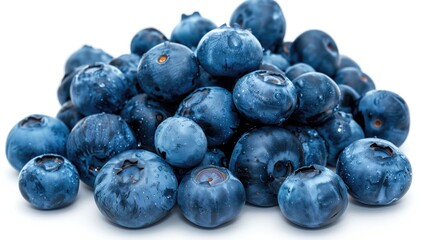 Pile of blueberries on white.