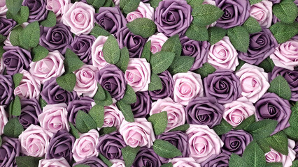 close-up of a decorative carpet of purple and pink artificial roses