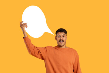 Man Holding White Speech Bubble Above His Head