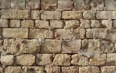 Stonewall, old brown stone pattern in textured wall, ancient bricks texture, facade material background. Generative AI.