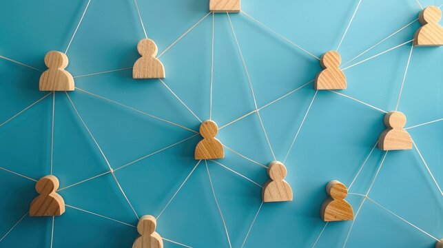 A simple social media idea featuring wooden figures on a blue background with lines linking