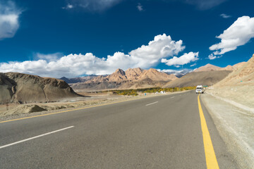Beautiful landscape with yellow-orange leaves in the October dry season and emerald green streams. blue sky There are mountains in the background at Ladakh in the Indian Himalayas.