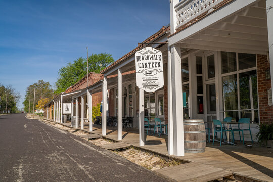 Arrow Rock, MO, USA - April 22, 2024: Street view of the historic town of Arrow Rock, Missouri, with Boardwalk Canteen in front.
