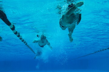 underwater pool, swimming people