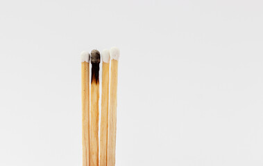 matches burned to symbolize burnout syndrome and mental illness