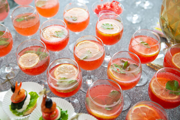 Glasses of orange lemonade with orange slices