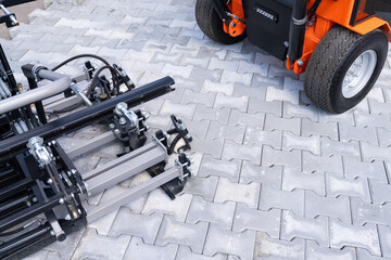 Paver laying machine close up.