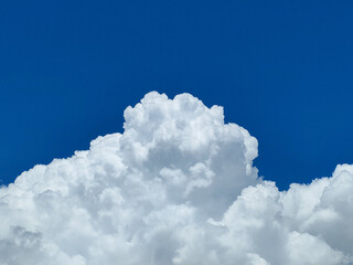 blue sky with huge pure white cloud
