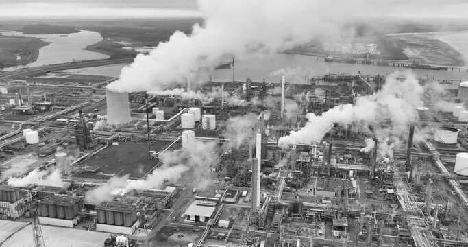 Aerial view on plastics production site. Heavy industrial facility. Chemical park terneuzen, The Netherlands. Grey scale, balck adn white.